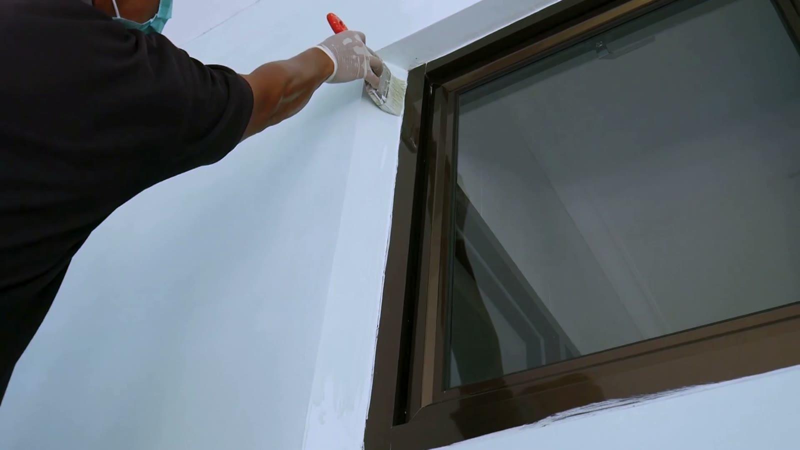 Cutting in with a brush along a window frame